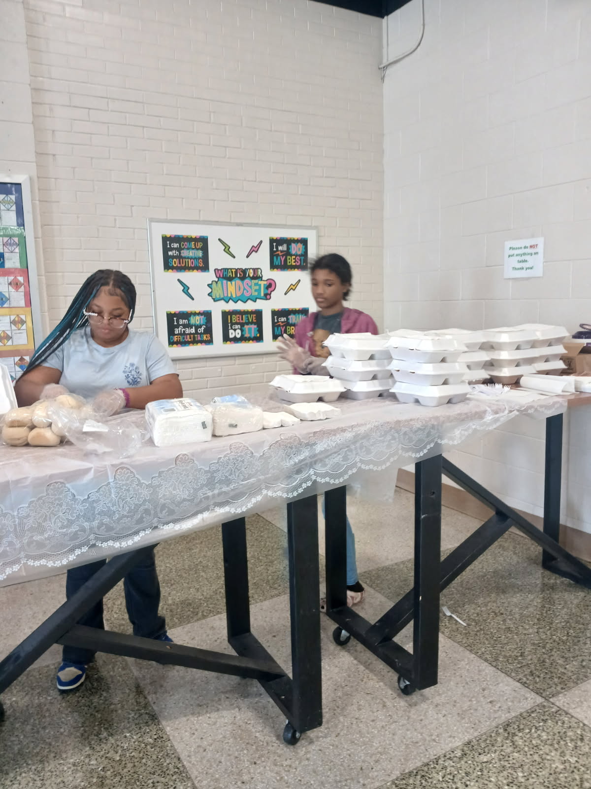 Children in the ministry feeding the Homeless